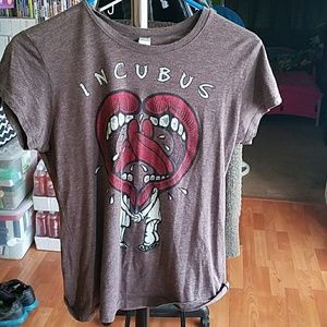 Incubus t-shirt fits more like a Large.